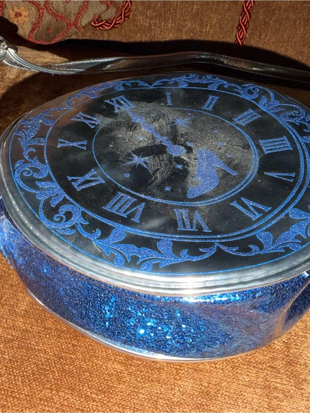Disney Parks Silver Round Crossbody Bag with Blue Clock Motif
